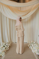 Cream Beige Floral Co-Ord Set — back view showing tied waist detail, styled with dusty pink hijab