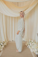 Sage Green Cape Co-Ord Set — side profile view, cape draped over shoulder