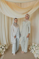 Sage Green Cape Co-Ord Set — styled alongside a matching pastel look, full-length group shot